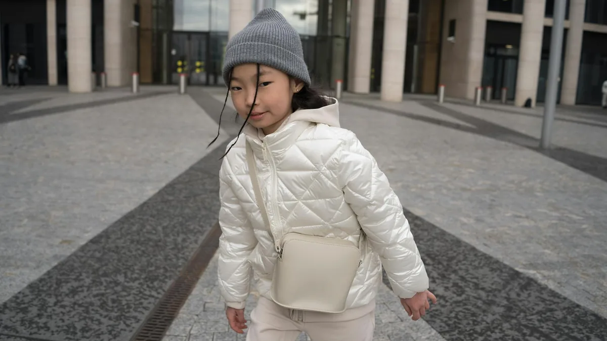Compact crossbody bag used on an everyday outing
